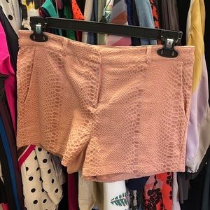 Very hot copper colored shirt with snake print design.